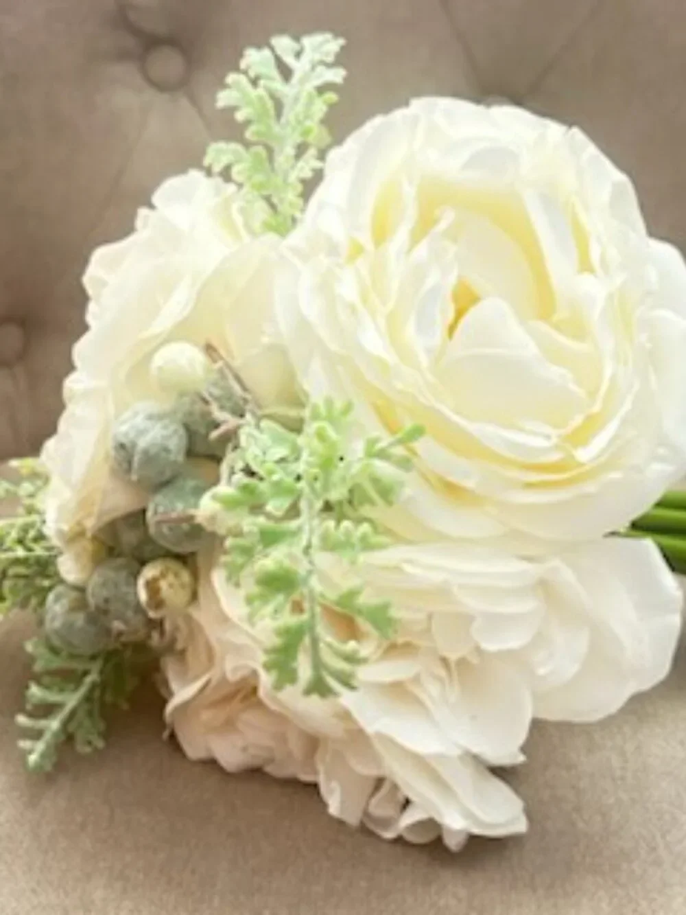 Delicate White Cream Bridal Bouquet With Berries and Greenery